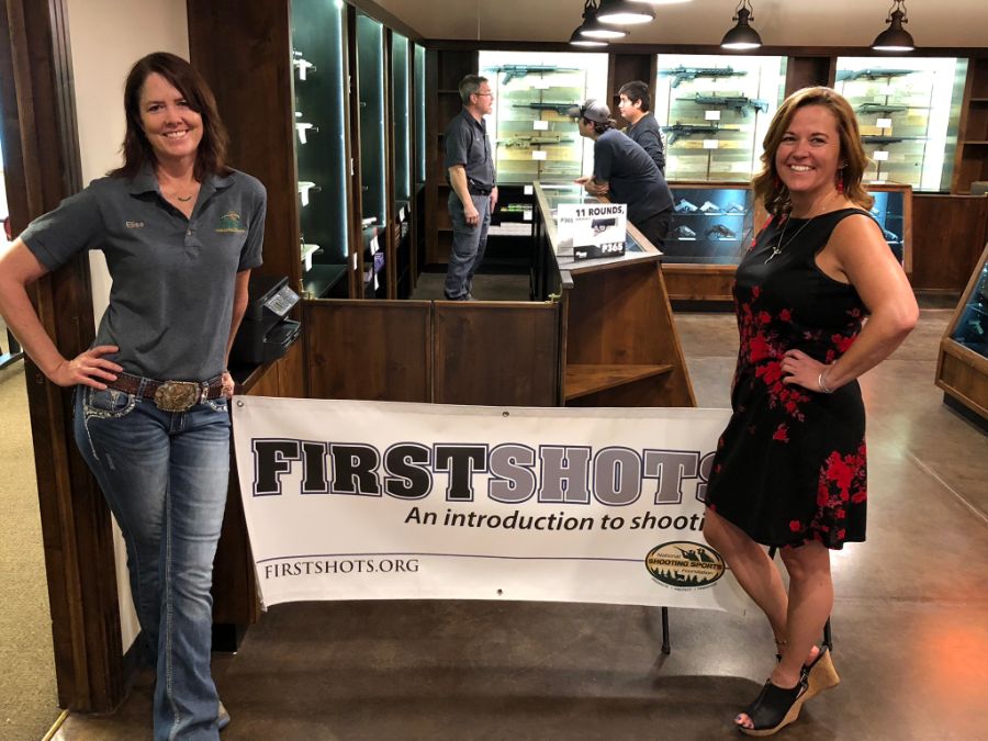 Timberline Firearms employees standing with First Shots banner