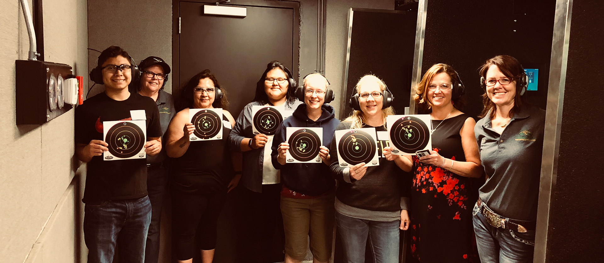Women shooters with targets at Timberline Firearms